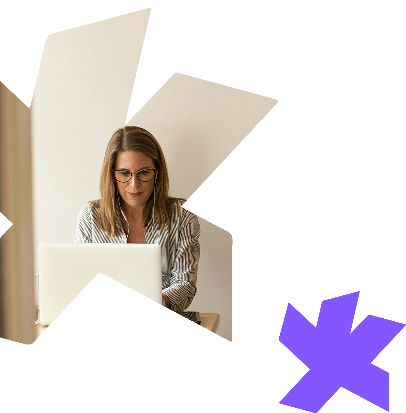 A person wearing glasses works on a laptop in front of a white wall, framed by a stylized, abstract purple star shape.