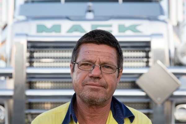 Kev in front of a Mack Truck — Freight Company in Townsville, QLD