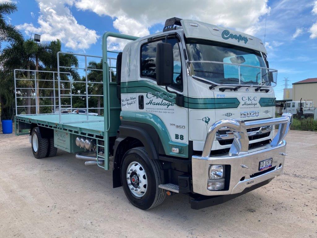 Green truck with rails — Hotshot Delivery in Townsville, QLD