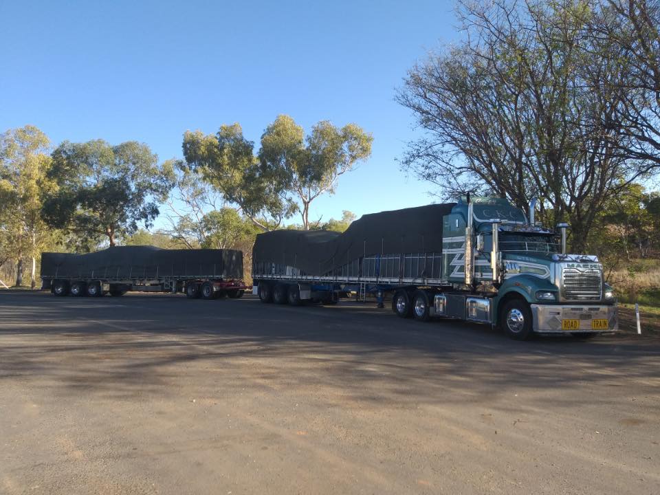Large green freight truck carrying goods — Transportation of Dangerous Goods in Townsville, QLD