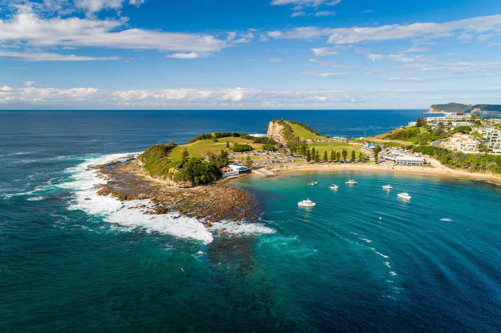 Aerial View Of A Small Island In The Middle Of The Ocean — Erina Car Air Conditioning In Terrigal, NSW
