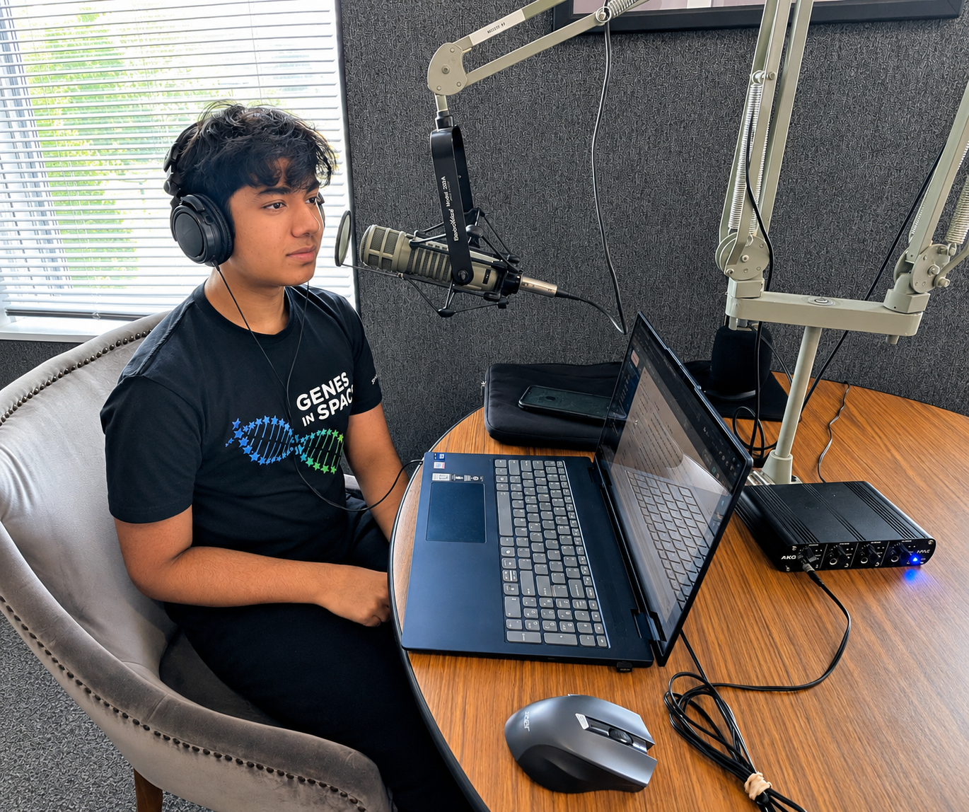 Aryash Shyam, Teen Scientist host, in a professional radio studio