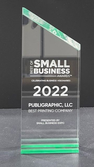 A small business award for 2022 sits on a table