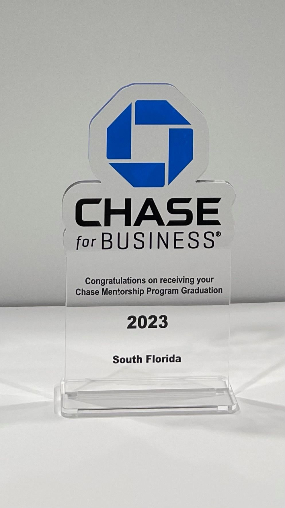 A chase for business award is sitting on a table