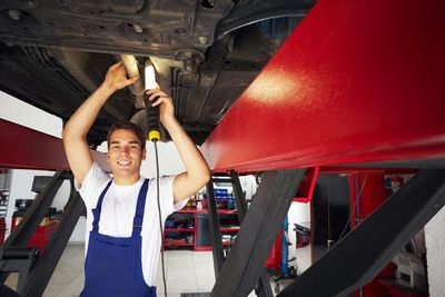 Transmission Repair Fulton — A Mechanic Working Under a Car in Fulton, IL