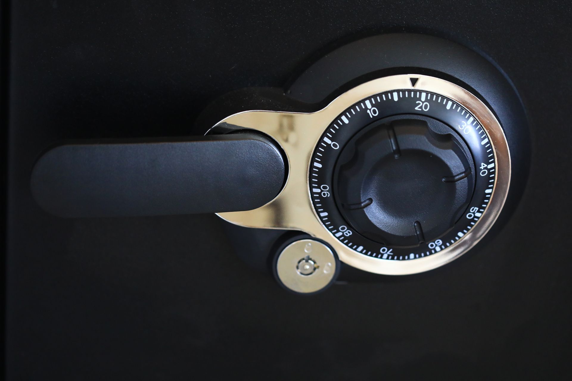 View of a combination dial of a personal safe zoomed in.