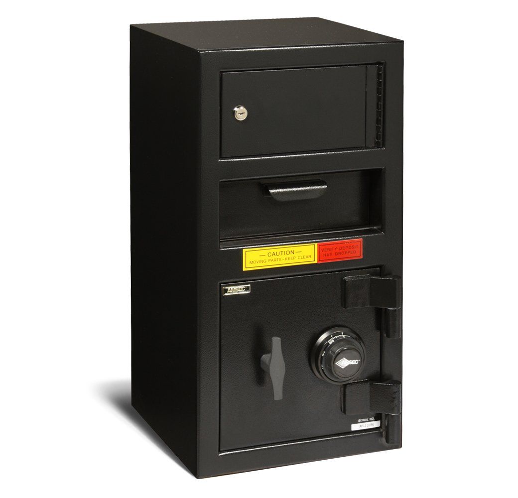 A black safe with a yellow and red sticker on it