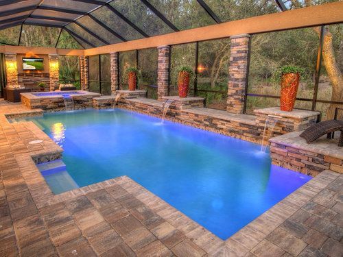 There is a large swimming pool in the middle of the house.