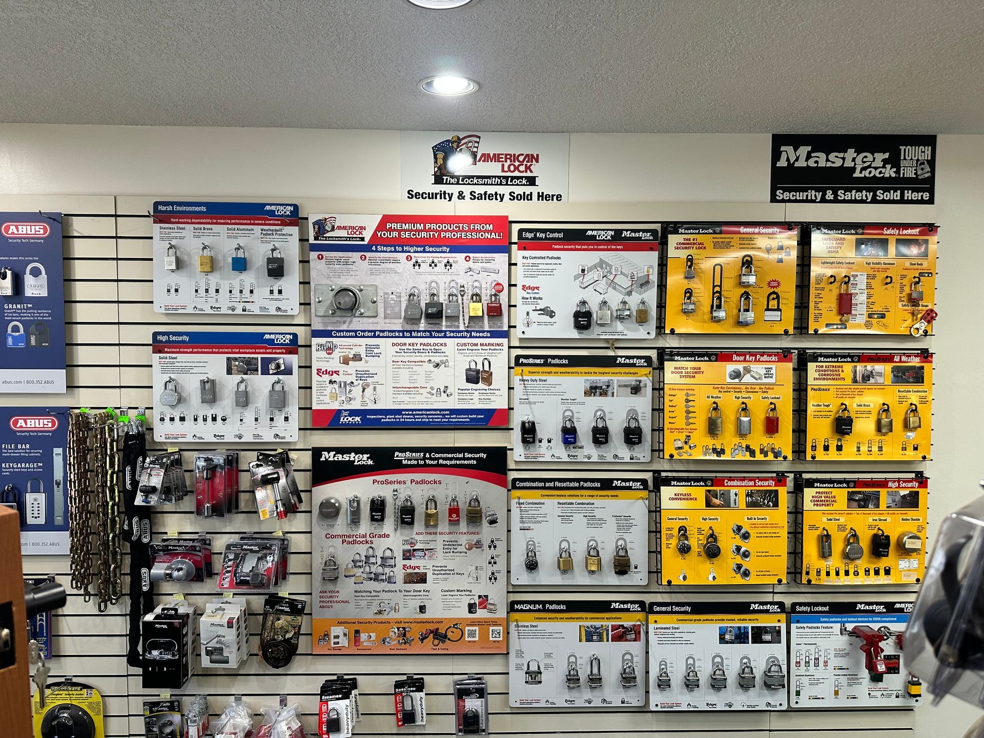 A row of safes are sitting on top of each other in a store.