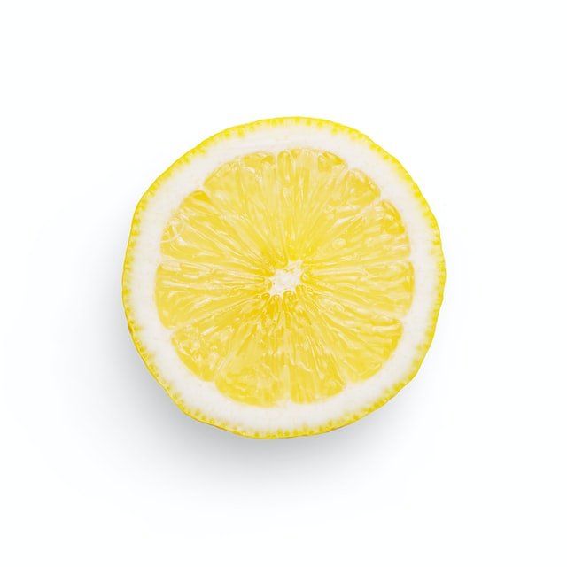 Slice of lemon representing citric acid, one of the ingredients in our organic weed control