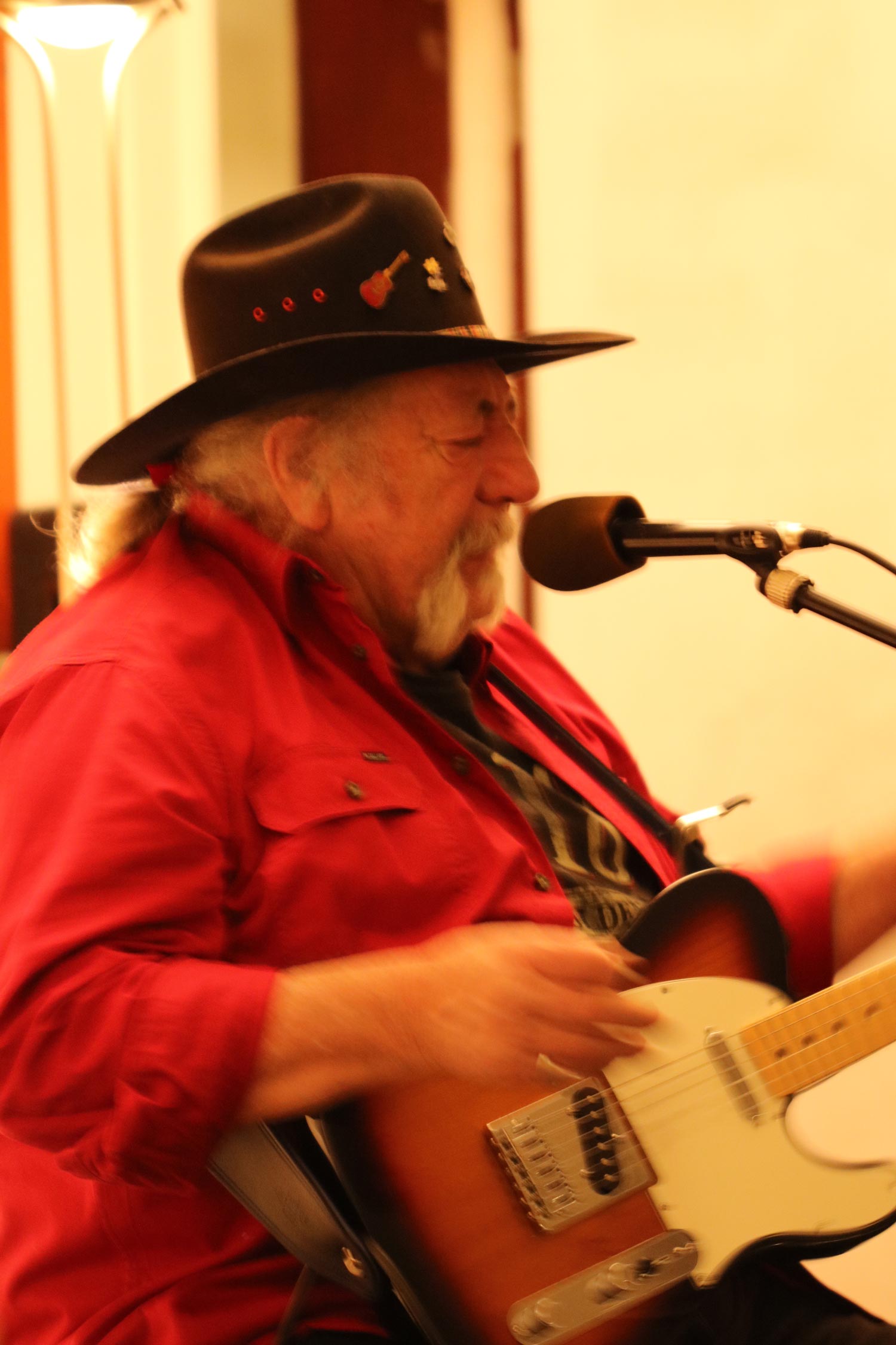 Oldman Playing Guitar