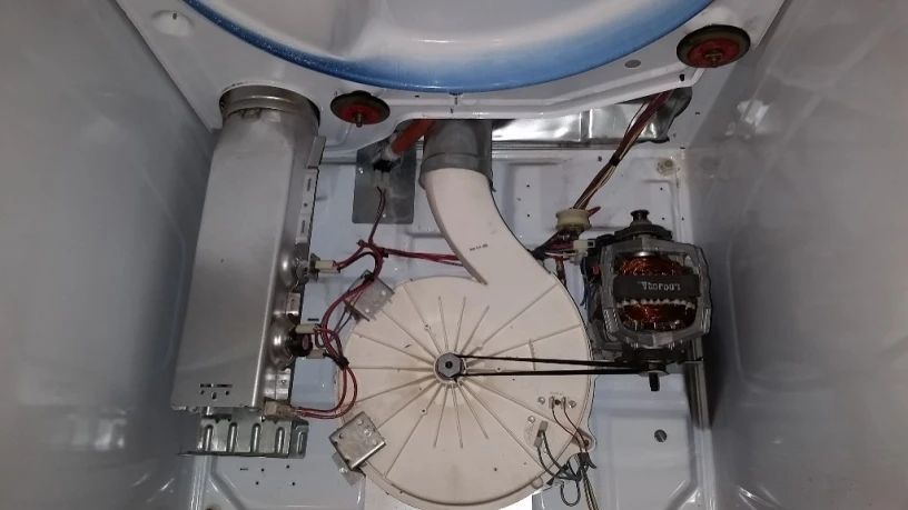 A close up of the inside of a washing machine.
