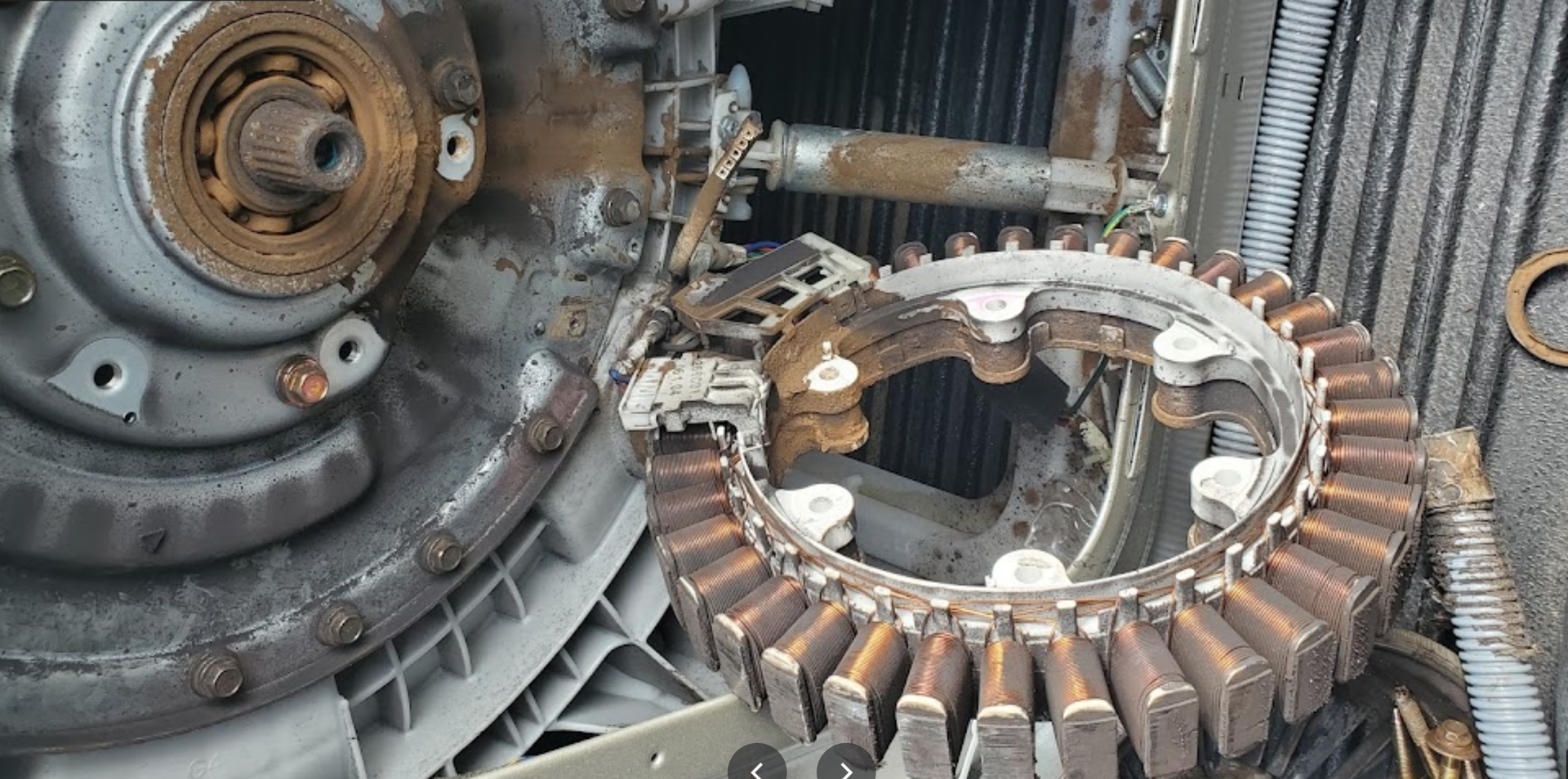A close up of a machine with a lot of gears on it.