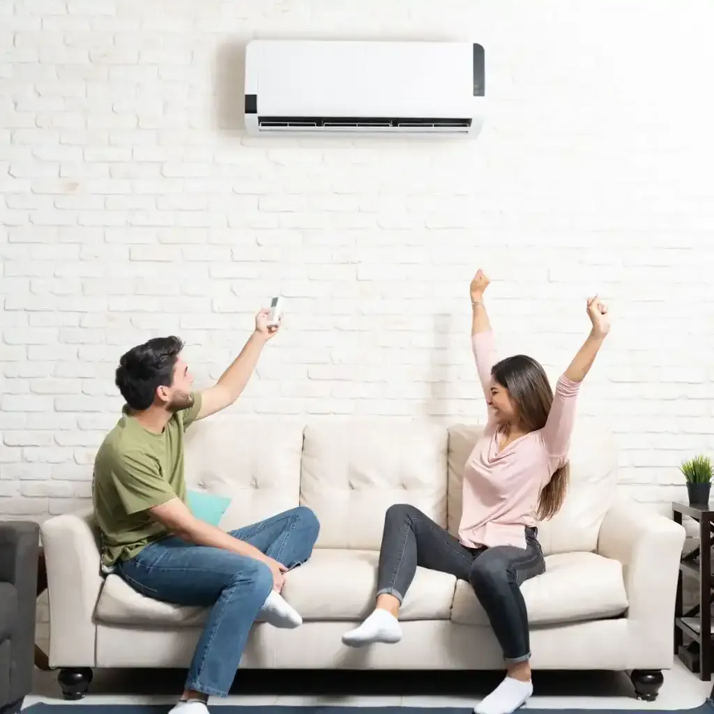 HVAC technician using gauges on an air conditioning unit for maintenance. Close-up on machinery.