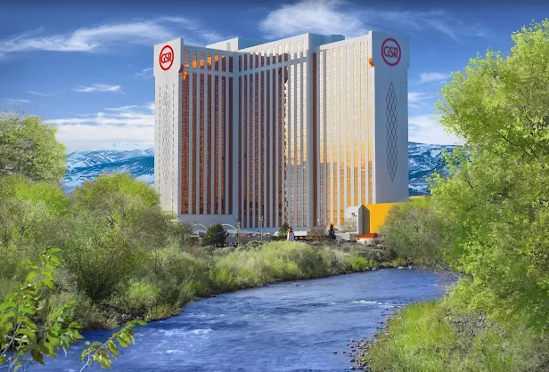 Blue and white trade show booth with cylindrical display and small table.