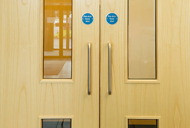 Wooden double fire doors with windows and 