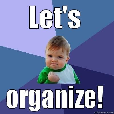 A baby with a fist in the air says let 's organize