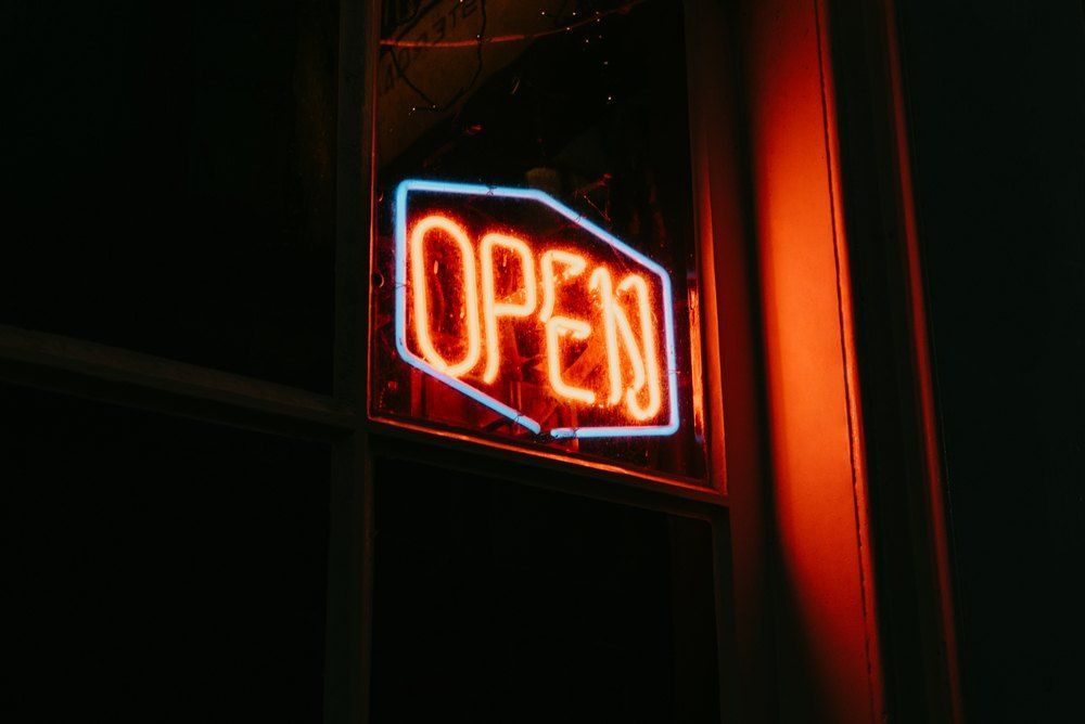 A Neon Sign That Says  