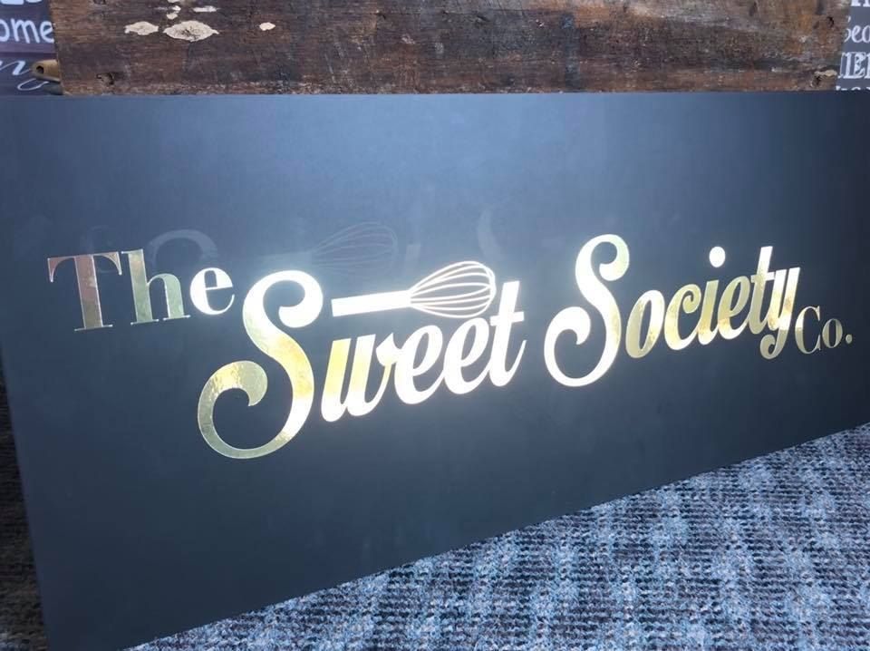 A Black Sign That Says the Sweet Society Co. — Signtek Gladstone in Biloela, QLD