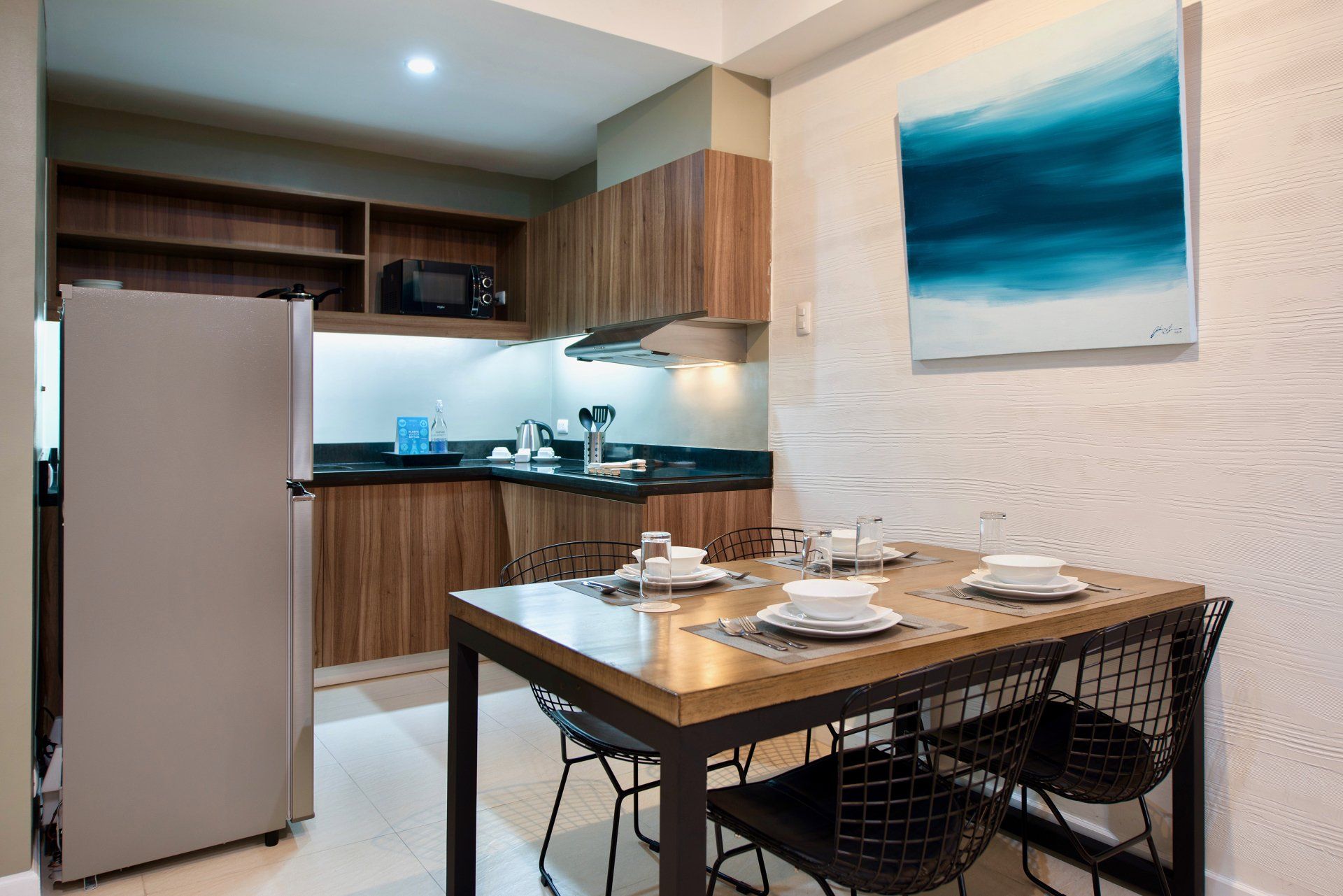 Modern kitchen and dining area at The Sphere Serviced Residences Makati