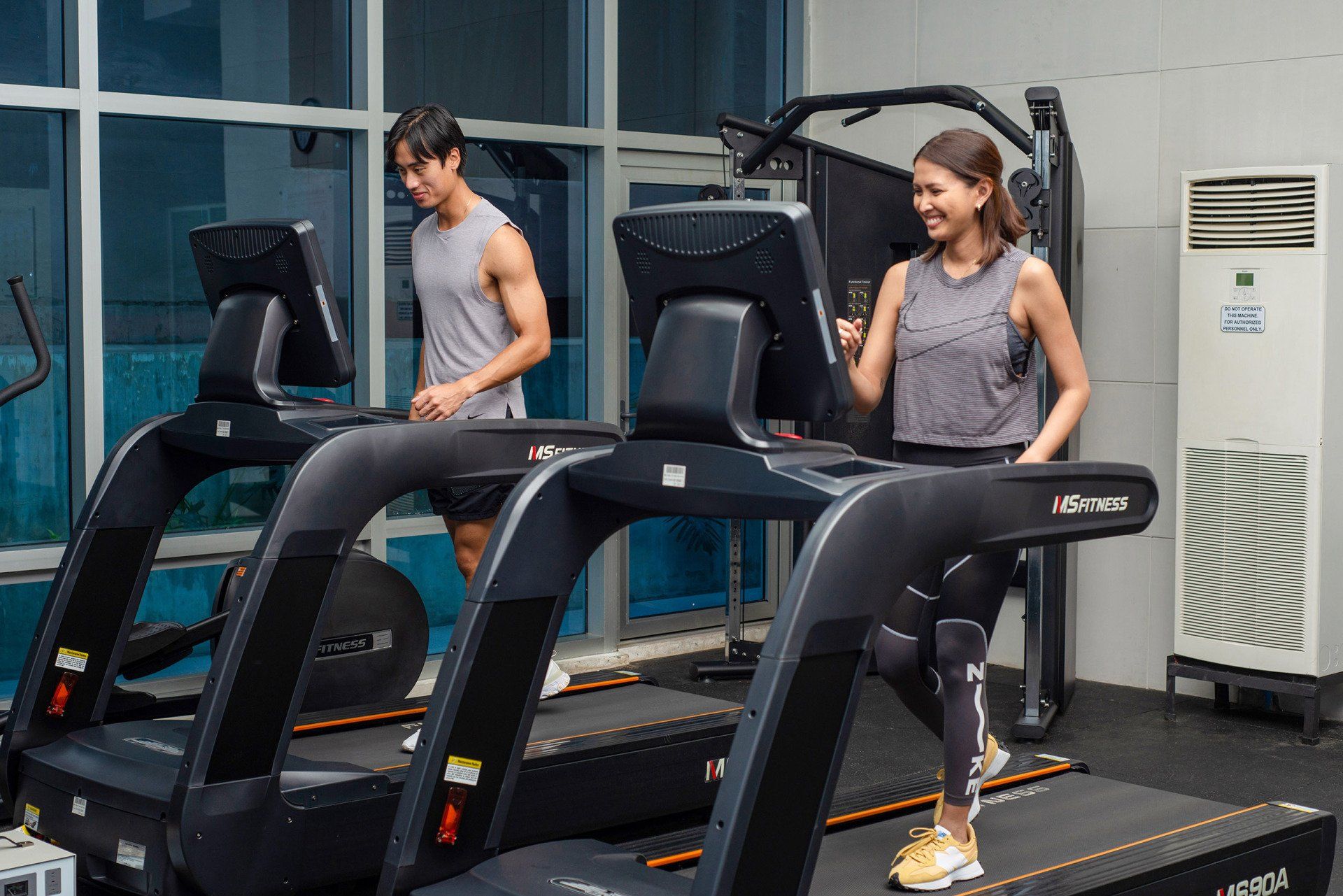 Guests working out at The Sphere Services Residences