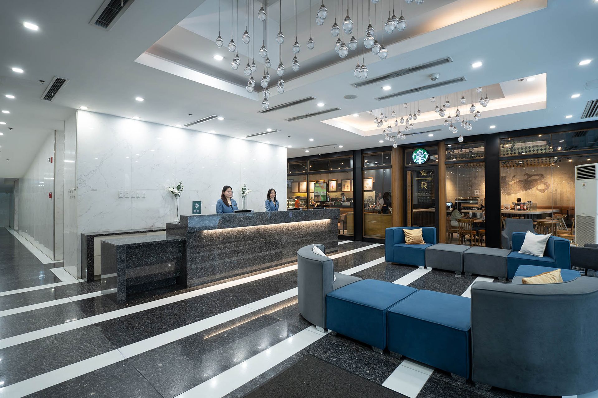 A pair of glasses sitting next to a remote control on a couch.