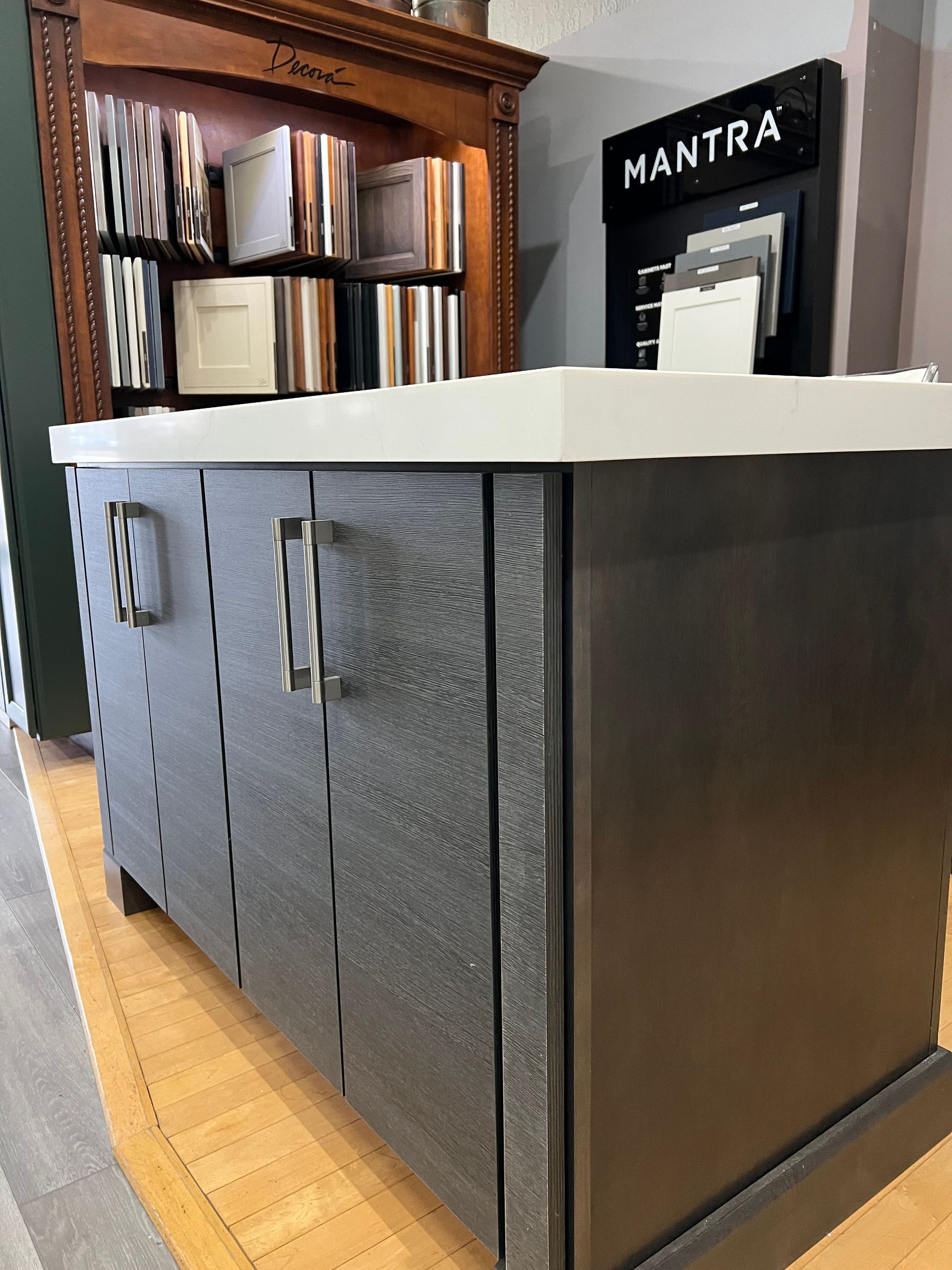 A counter with a sign that says mantra on it