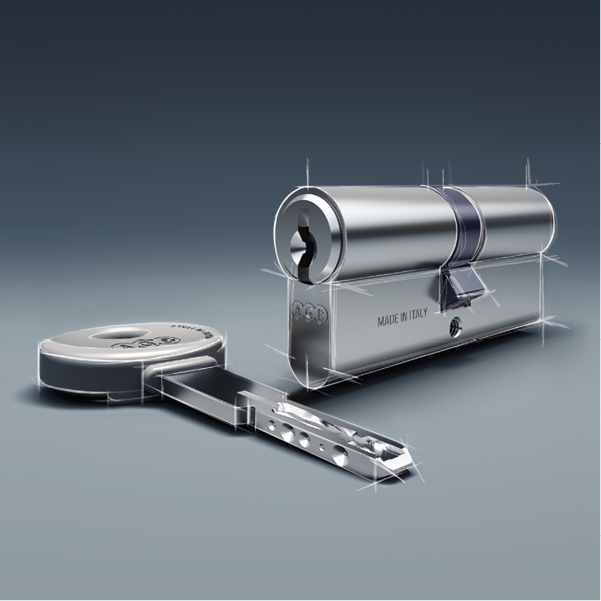 Primo piano di una chiave e di una serratura su un tavolo.