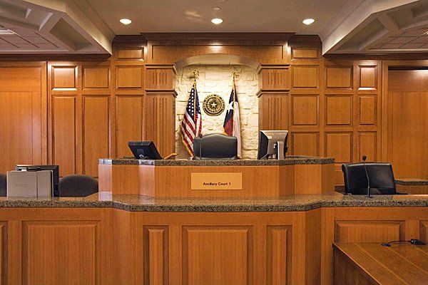 courtroom with american and texas flag