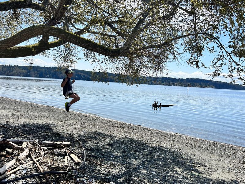 Person Meditating on a Dock in a Lake