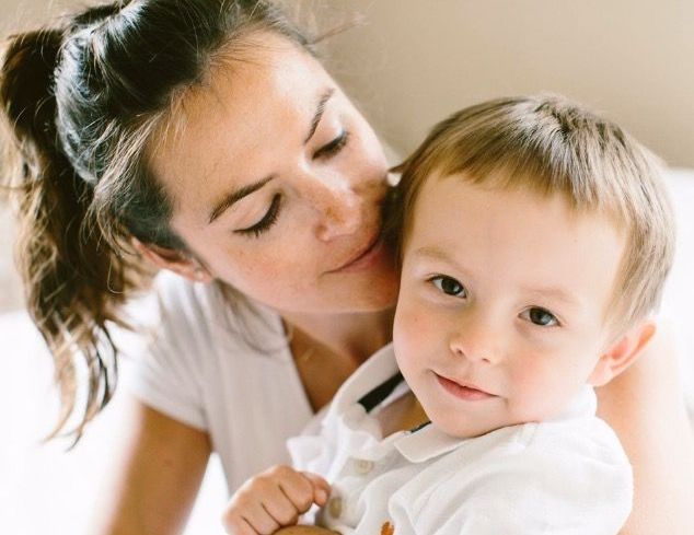 Mother and Child Hugging Each Other