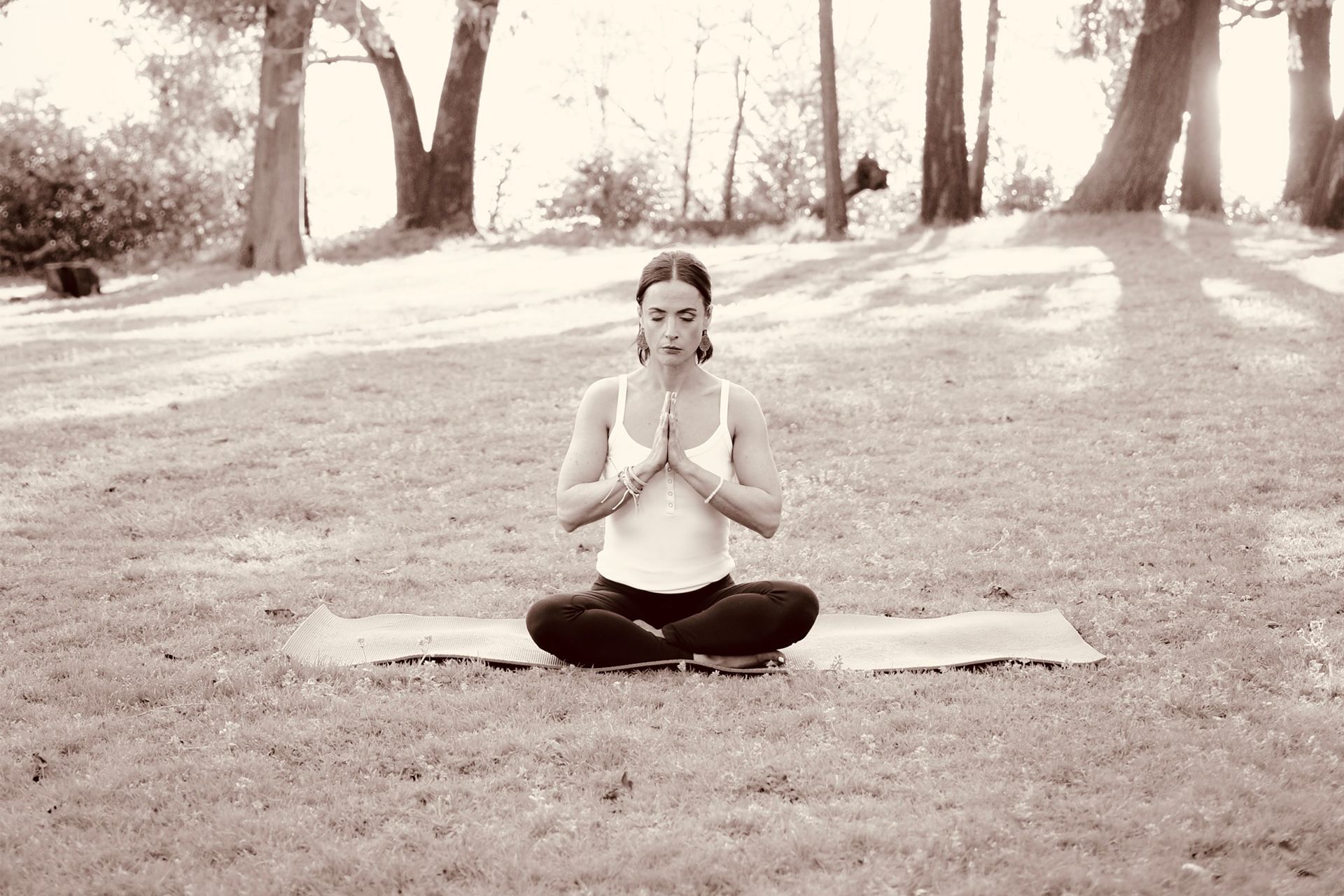Danica in Park Doing Meditation