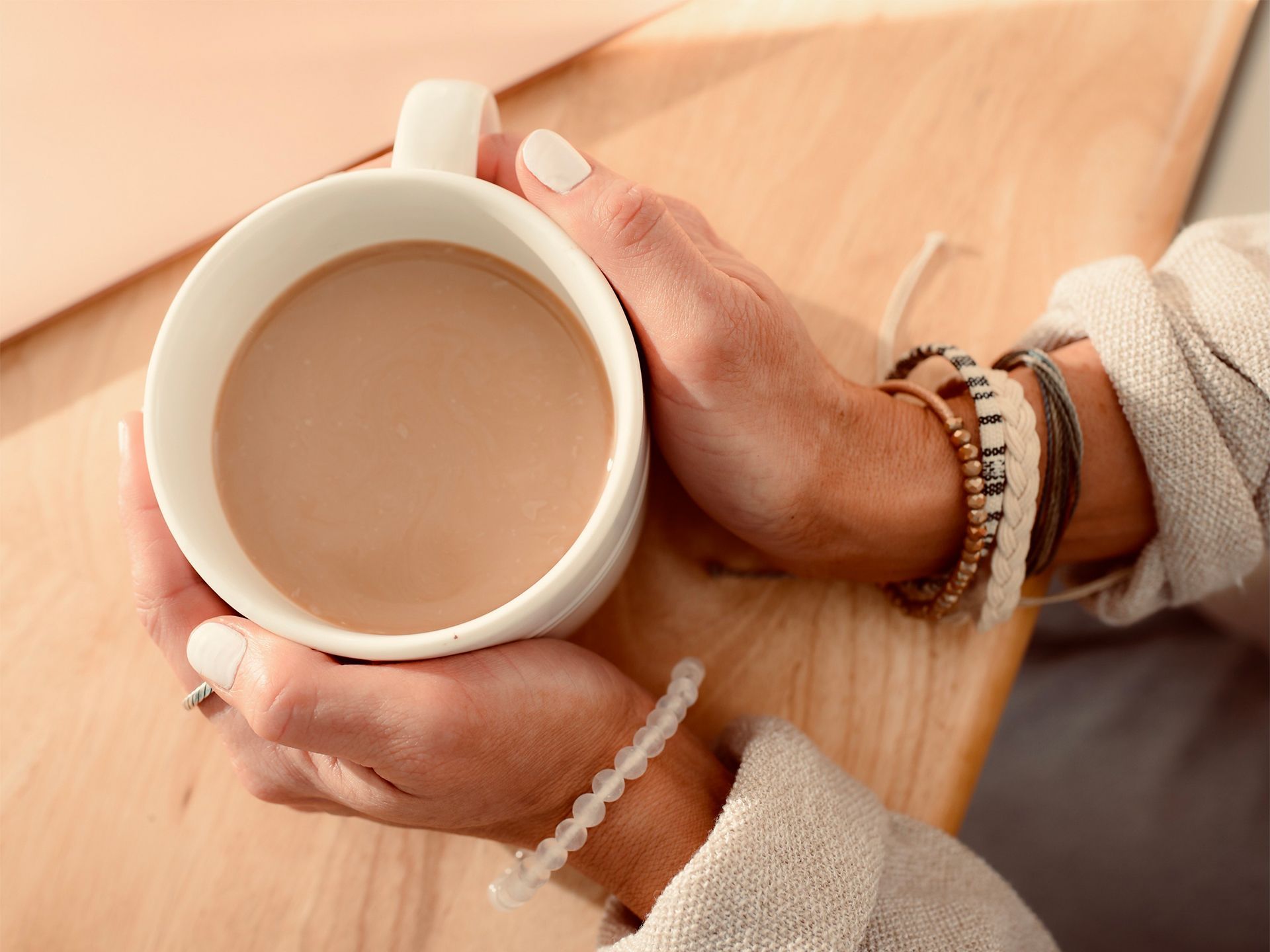 Danica Holding a Cup of Coffee