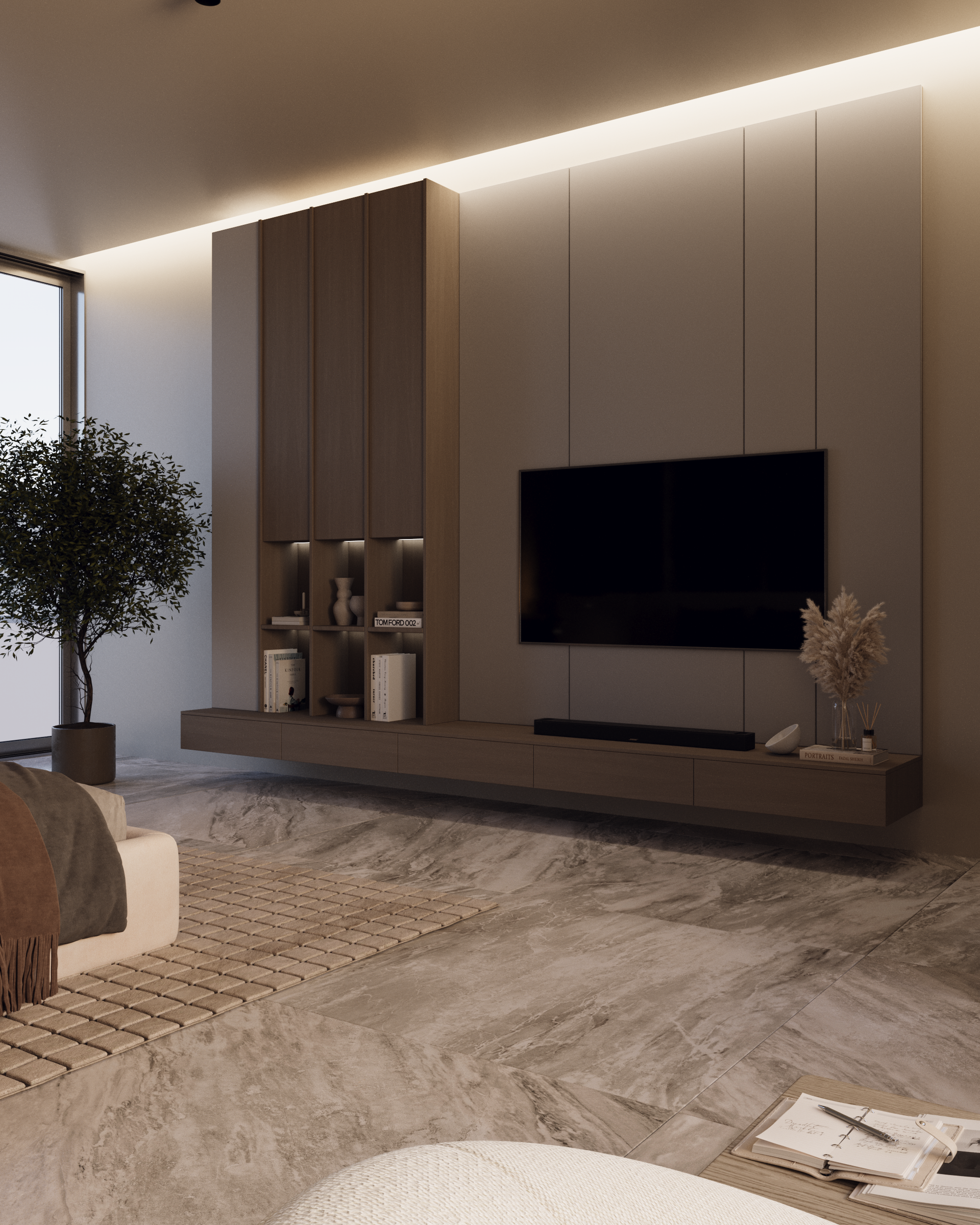 Dormitorio con mueble de entretenimiento de madera flotante, TV y piso de piedra.