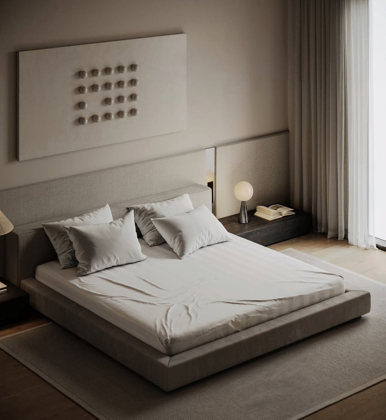 Un dormitorio moderno con una cama de plataforma gris, ropa de cama blanca y obras de arte en la pared.