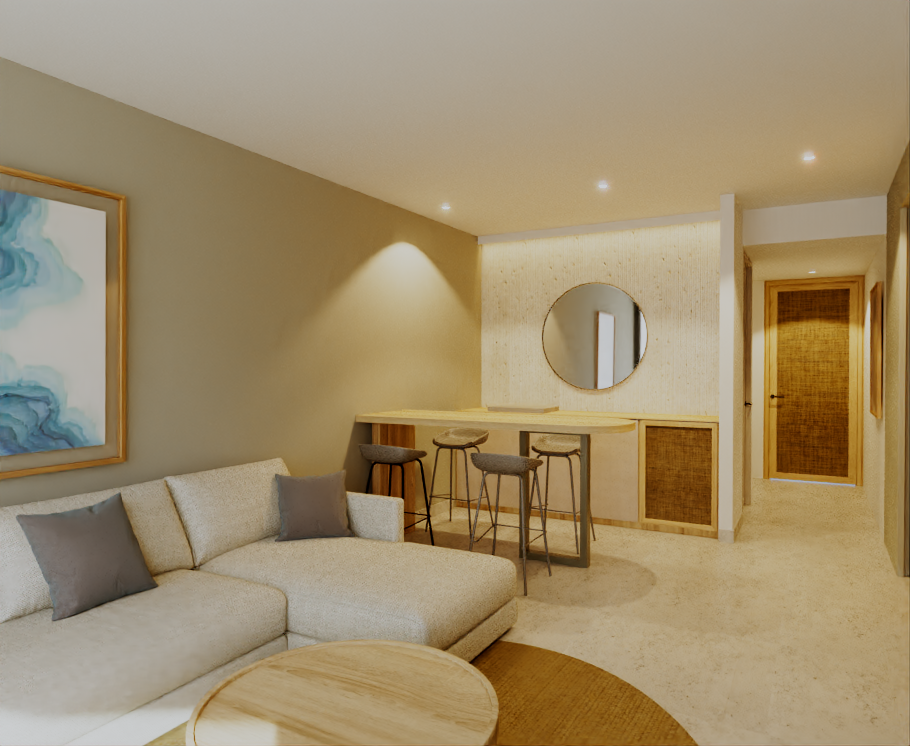 Living room with a light sofa, bar with stools, and art.