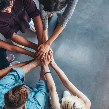 group of hands showing support