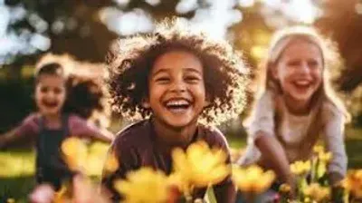 chldren smiling outside showing confidence