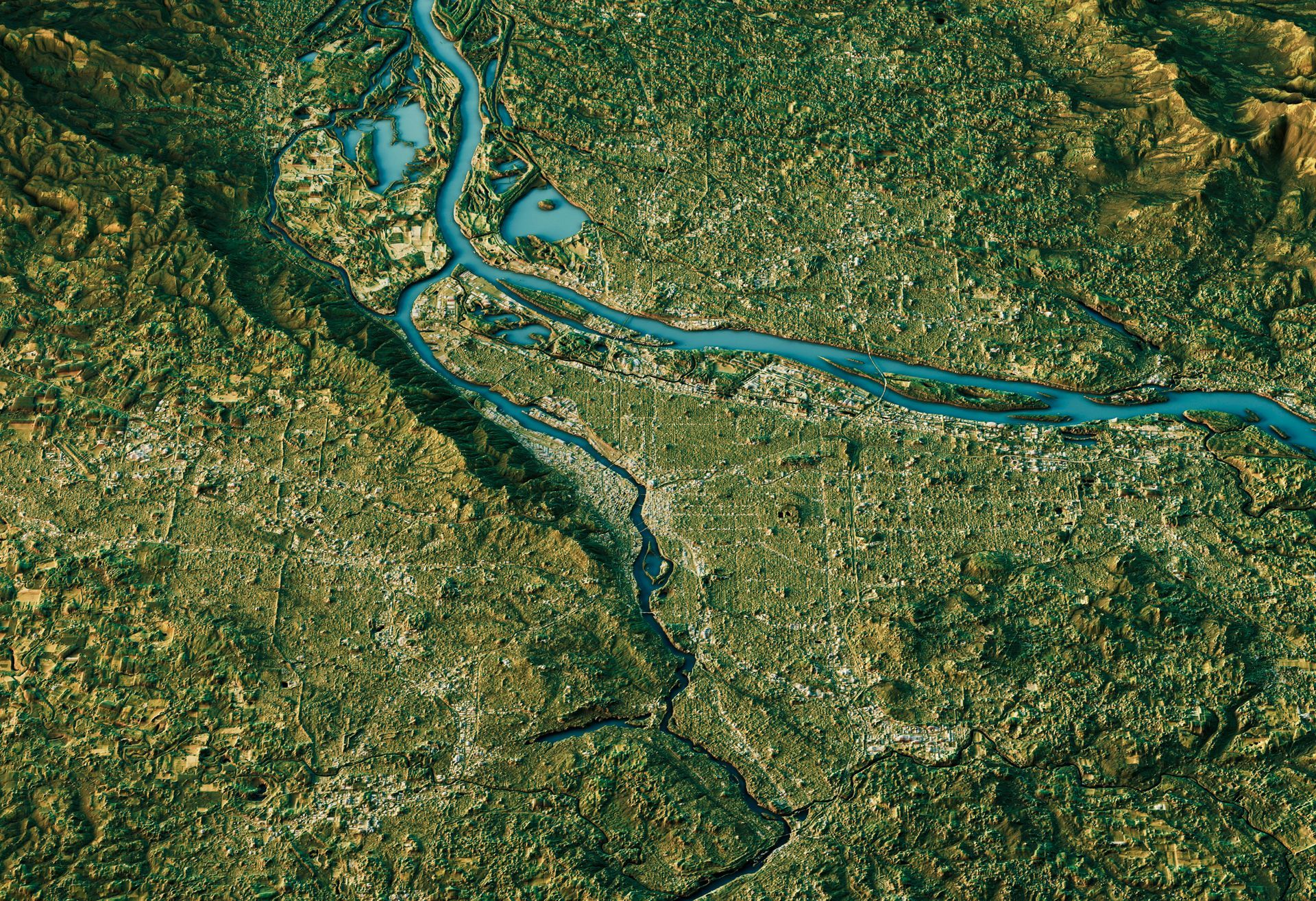 An aerial view of a city with a river running through it
