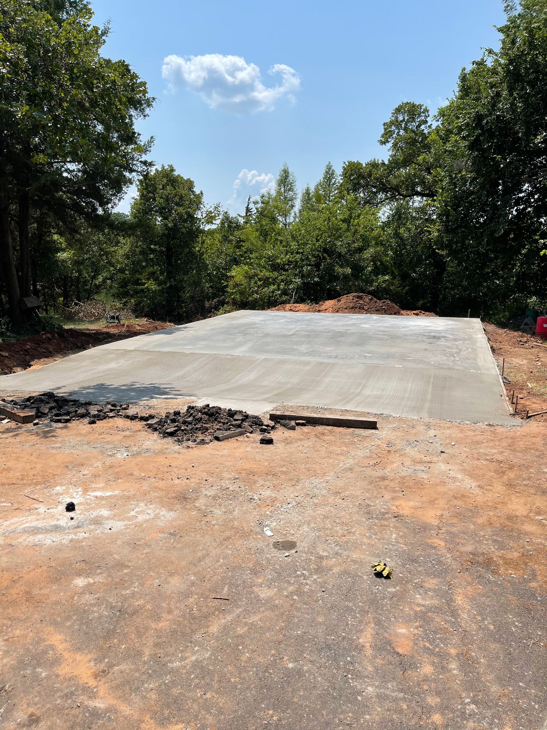 Brick wall with deteriorating plaster; brown bricks, beige plaster.