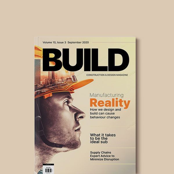A man wearing a hard hat is on the cover of a build magazine
