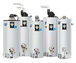 A group of water heaters sitting next to each other on a white background.