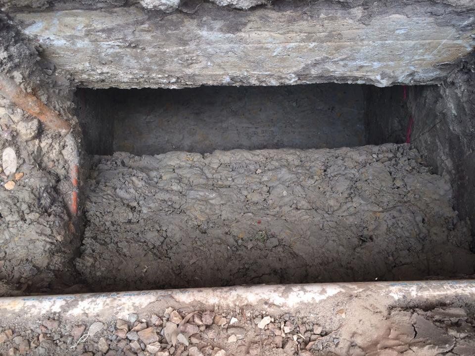 A Hole in the Ground Filled With Dirt and Rocks — Melbourne, VIC — Special Reblocking Services