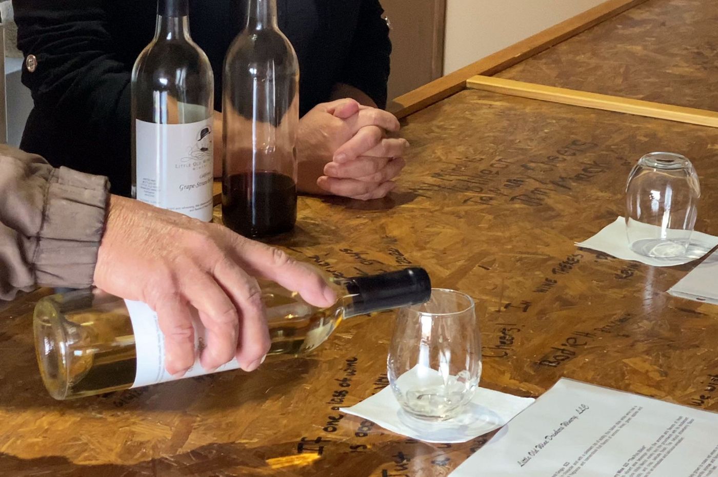 Man pouring wine for tasting.
