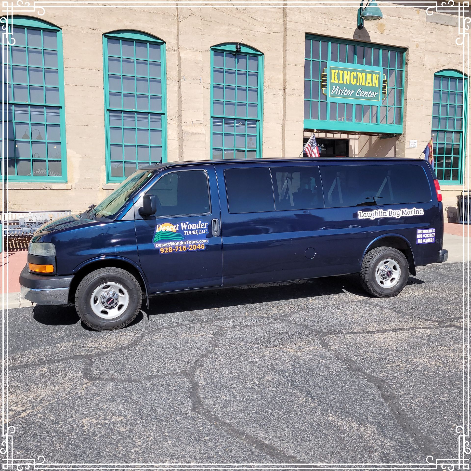 A blue van is parked in front of a building that says kingway