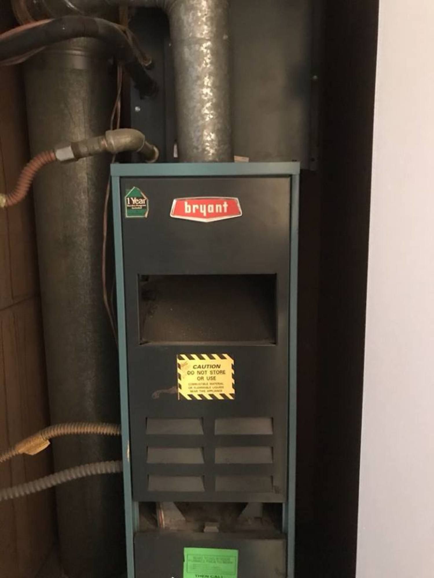 a black and blue stove with the word bryant on it