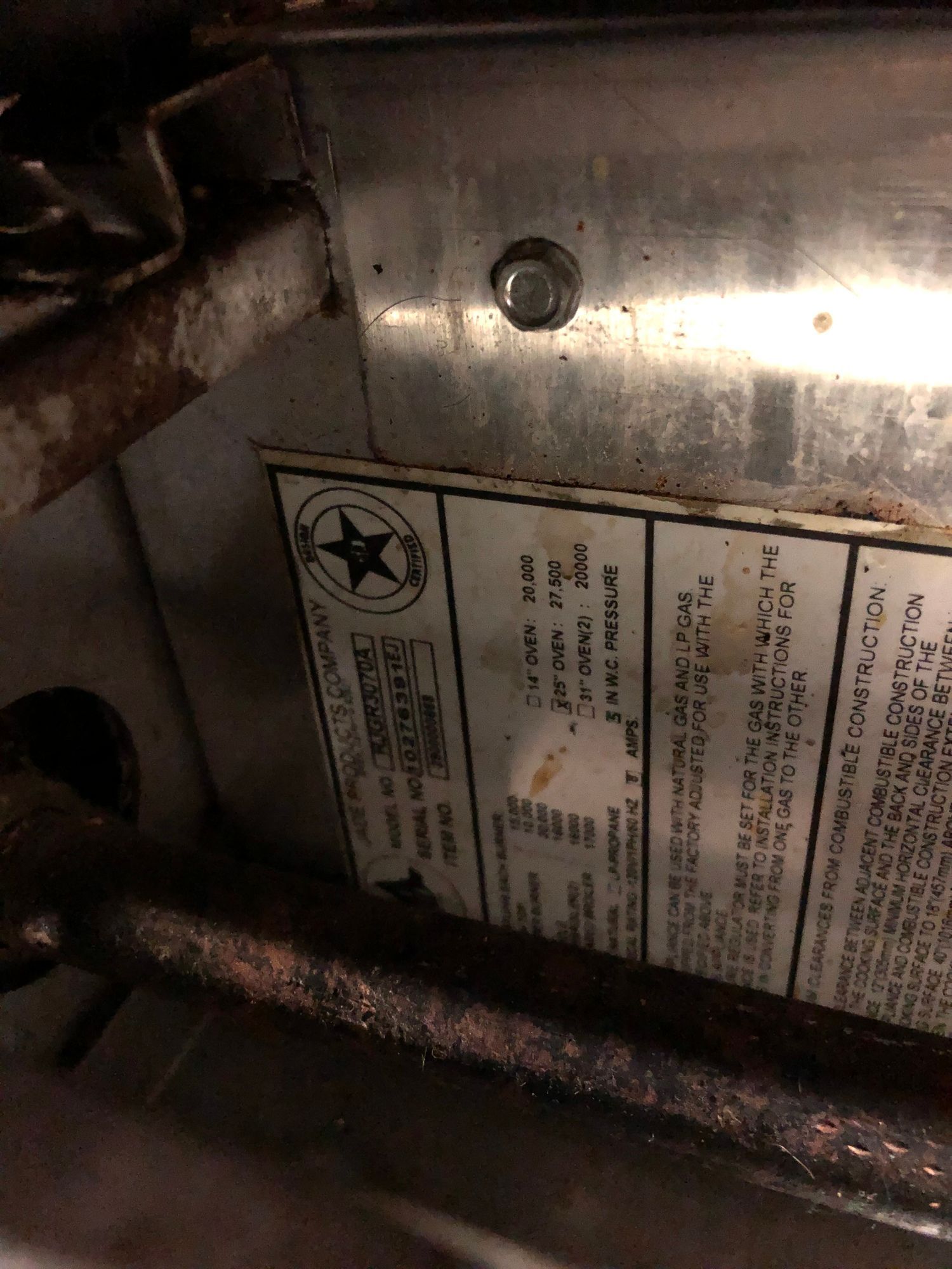 a close up of a metal item with a label on it .