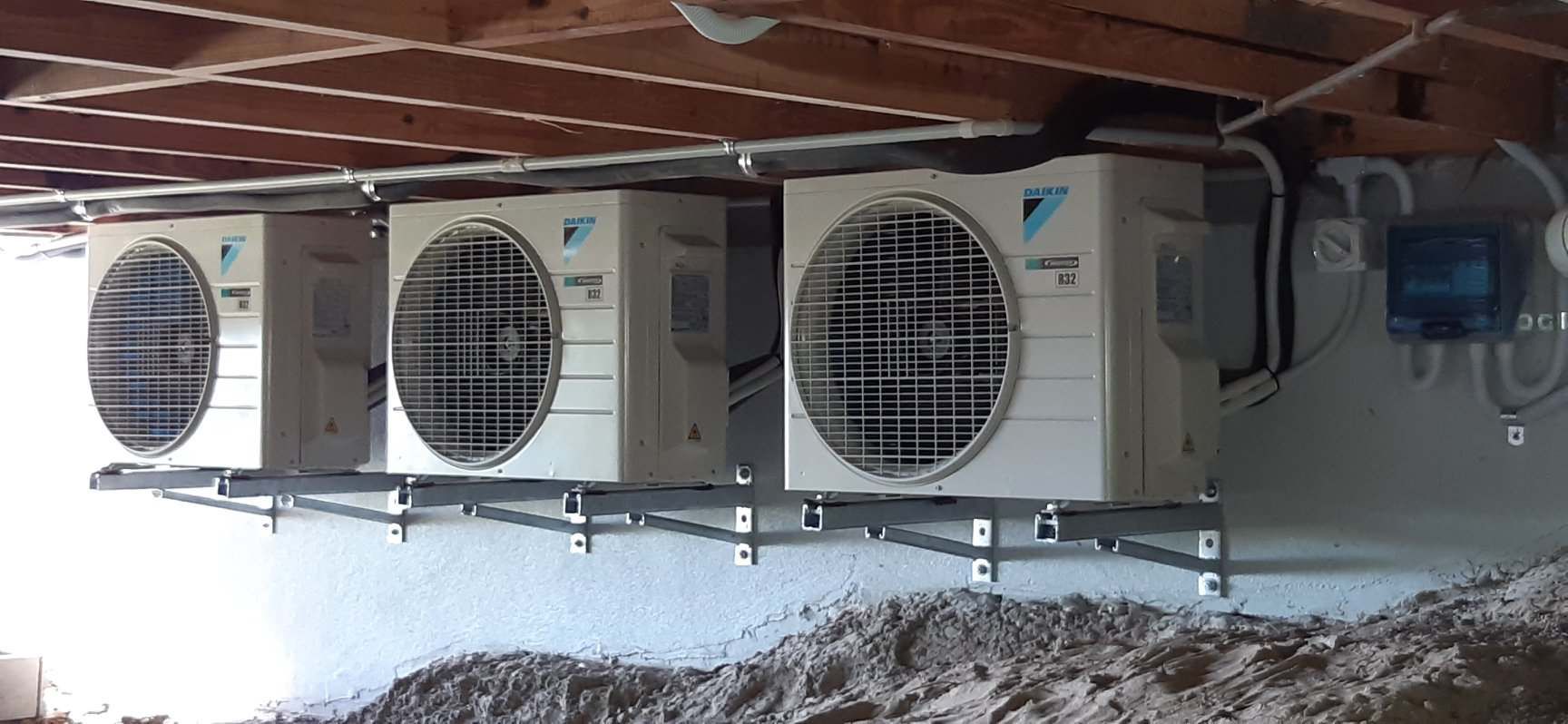 A Bunch of Air Conditioners Are Hanging from The Ceiling — McGuire Air & Refrigeration In Paget, QLD