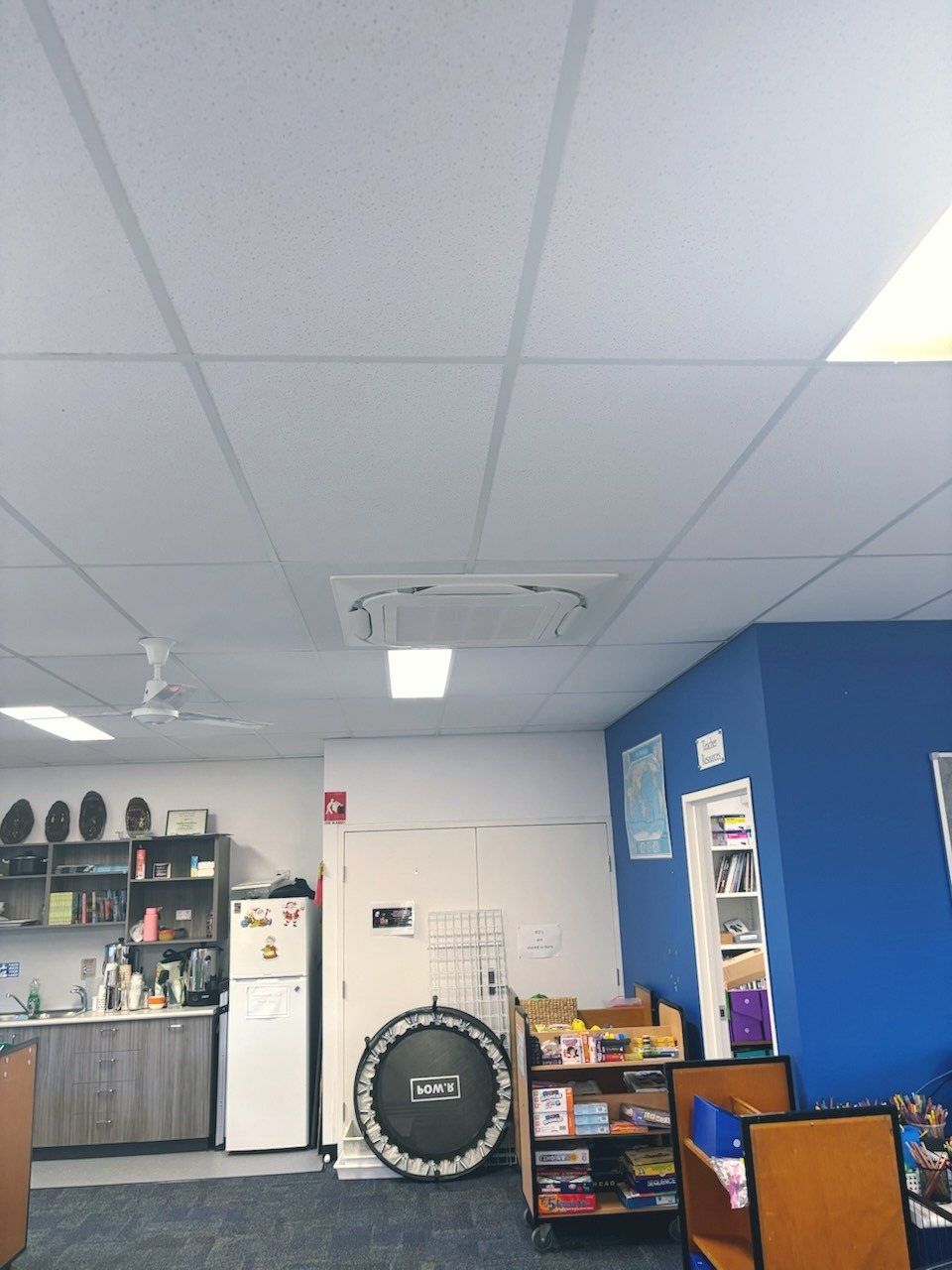 A Room with A White Ceiling and Blue Walls — McGuire Air & Refrigeration In Paget, QLD