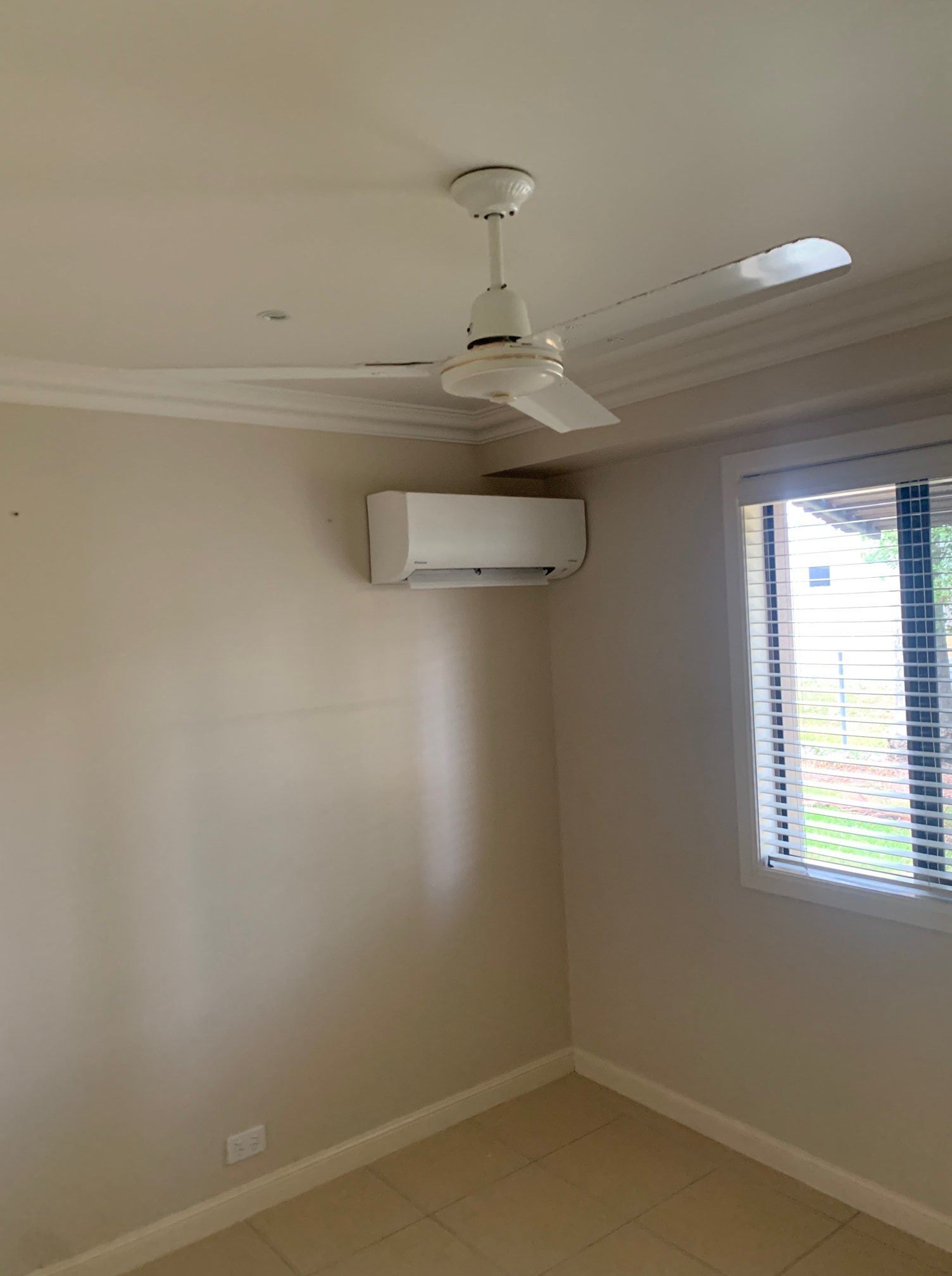 There Is a Ceiling Fan in The Corner of The Room — McGuire Air & Refrigeration In Walkerston, QLD